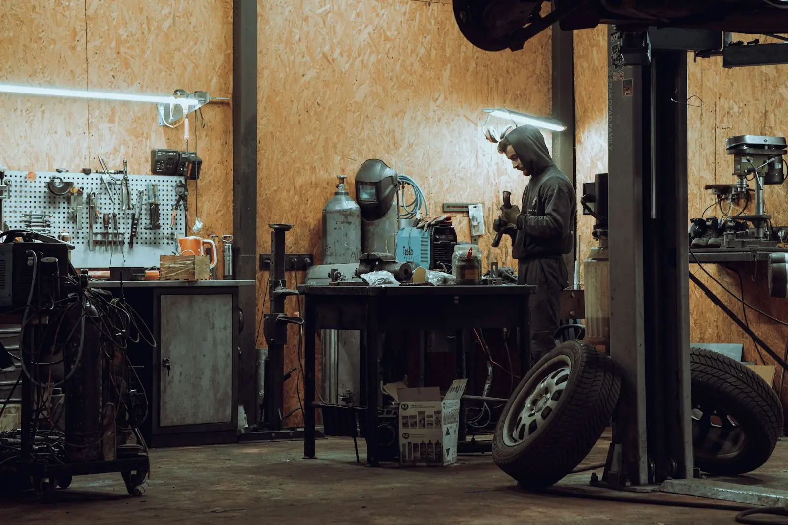 RV technician at work in a service shop
